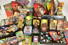 YU-GI-OH GX THE ULTIMATE GUIDE ISSUES 1-35, 2 COLLECTORS TINS AND APPROXIMATELY 1600 YU-GI-OH CARDS,