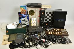 TWO BOXES OF GAME CONSOLES, CONTROLLERS, ACESSORIES, COMMODORE 64 GAMES AND CHESS COMPUTERS,