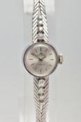 A MID 20TH CENTURY DIAMOND WHITE METAL MANUAL WIND WRISTWATCH, the circular silver tone dial, with