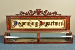 A 19TH CENTURY MAHOGANY DISPENSING APOTHECARY CABINET, with an carved foliate surmount, coloured