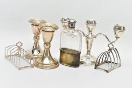 EARLY TO MID 20TH CENTURY SILVERWARE, the first a three branch silver candle stick, tapered stem