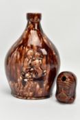 A VICTORIAN JOSEPH THOMPSON HARTSHORNE POTTERY TREACLE GLAZED MASK INKWELL / PEN REST, modelled as a