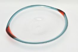 NEIL WILKIN (BRITISH 20TH CENTURY) A LARGE SHALLOW GLASS BOWL, having a clear body and coloured rim,