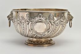 A VICTORIAN SILVER PUNCH BOWL, with cast lion mask and ring handles, the bowl repousse decorated