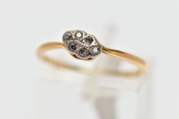 AN 18CT GOLD DIAMOND RING, six single cut diamonds set in a white metal navette shaped mount,