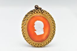 AN 18TH CENTURY CARNELIAN AND PASTE CAMEO PENDANT, an oval cut carnelian showing some curved