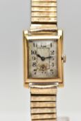 A YELLOW METAL WRISTWATCH, a hand wound movement, rectangular dial, Arabic numerals, subsidiary