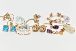 AN ASSORTMENT OF YELLOW METAL EARRINGS, a box of assorted yellow metal earrings set with semi-