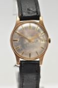A 9CT GOLD WRISTWATCH, manual wind, round dial, baton markers, date at the three o'clock position,