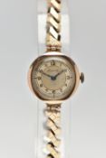 A 9CT GOLD WRISTWATCH, a hand wound movement, round dial, Arabic numerals, polished gold case,