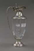 A silver mounted claret jug. 26.5 cm high.