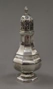 A silver sugar sifter. 18.5 cm high. 167.3 grammes.