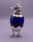 A Continental table lighter formed as a chicken.