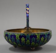 A Russian silver and enamel basket. 10.5 cm diameter. 193.4 grammes total weight.