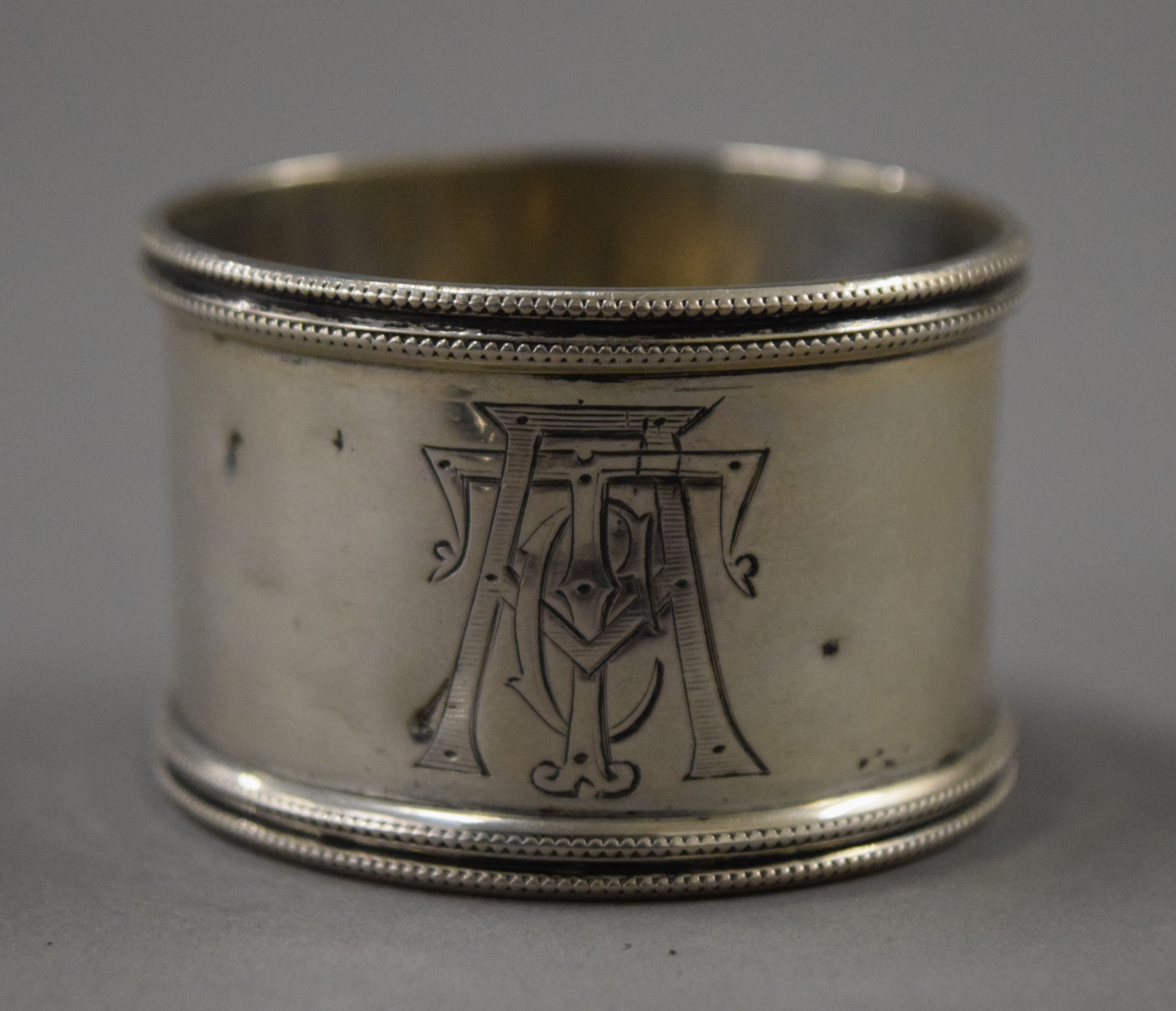 A cased silver cruet set, spoons and a napkin ring. 167.8 grammes. - Image 10 of 20