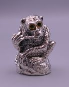 A 925 silver monkey form pin cushion. 3 cm high.