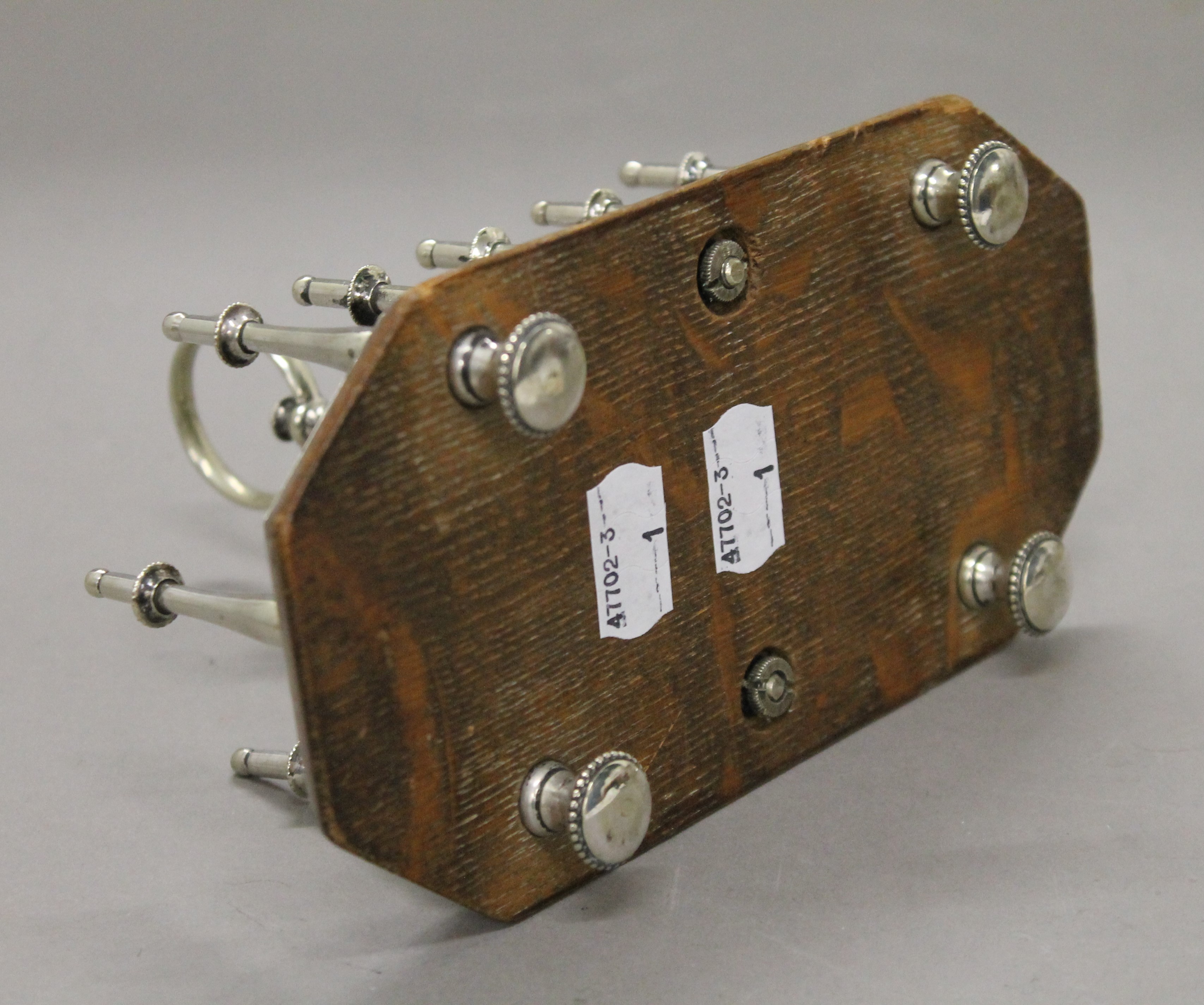 A Victorian silver plated and oak toast rack. 18.5 cm long. - Image 3 of 4