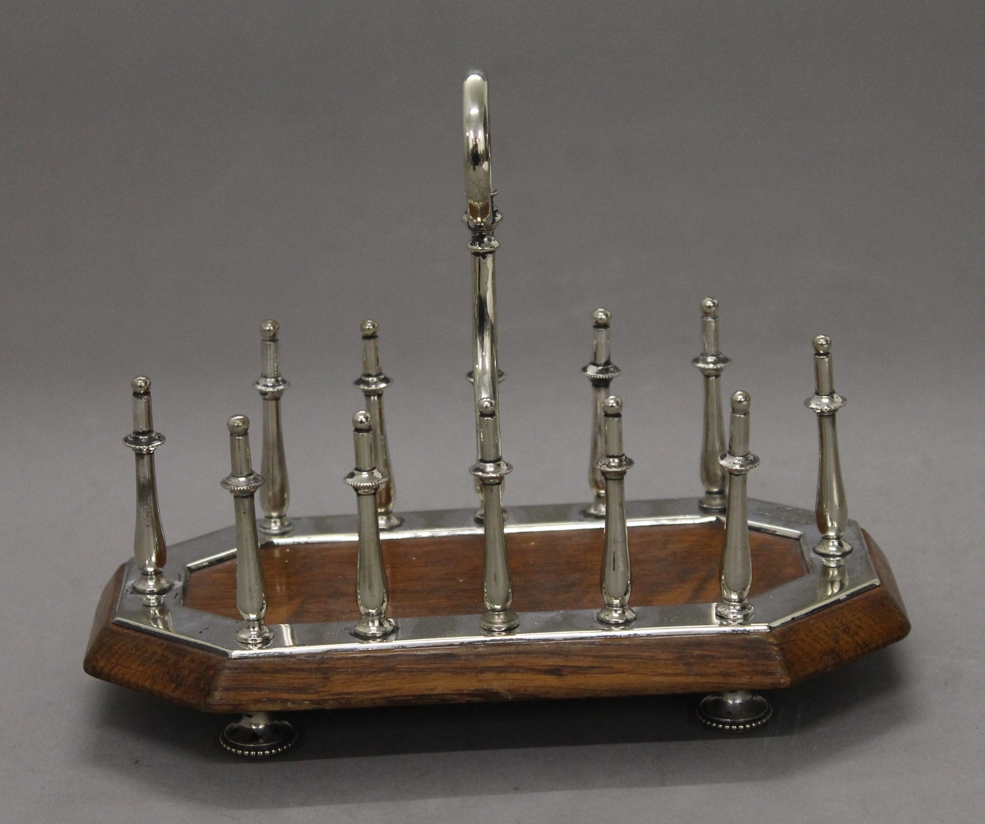 A Victorian silver plated and oak toast rack. 18.5 cm long. - Image 2 of 4