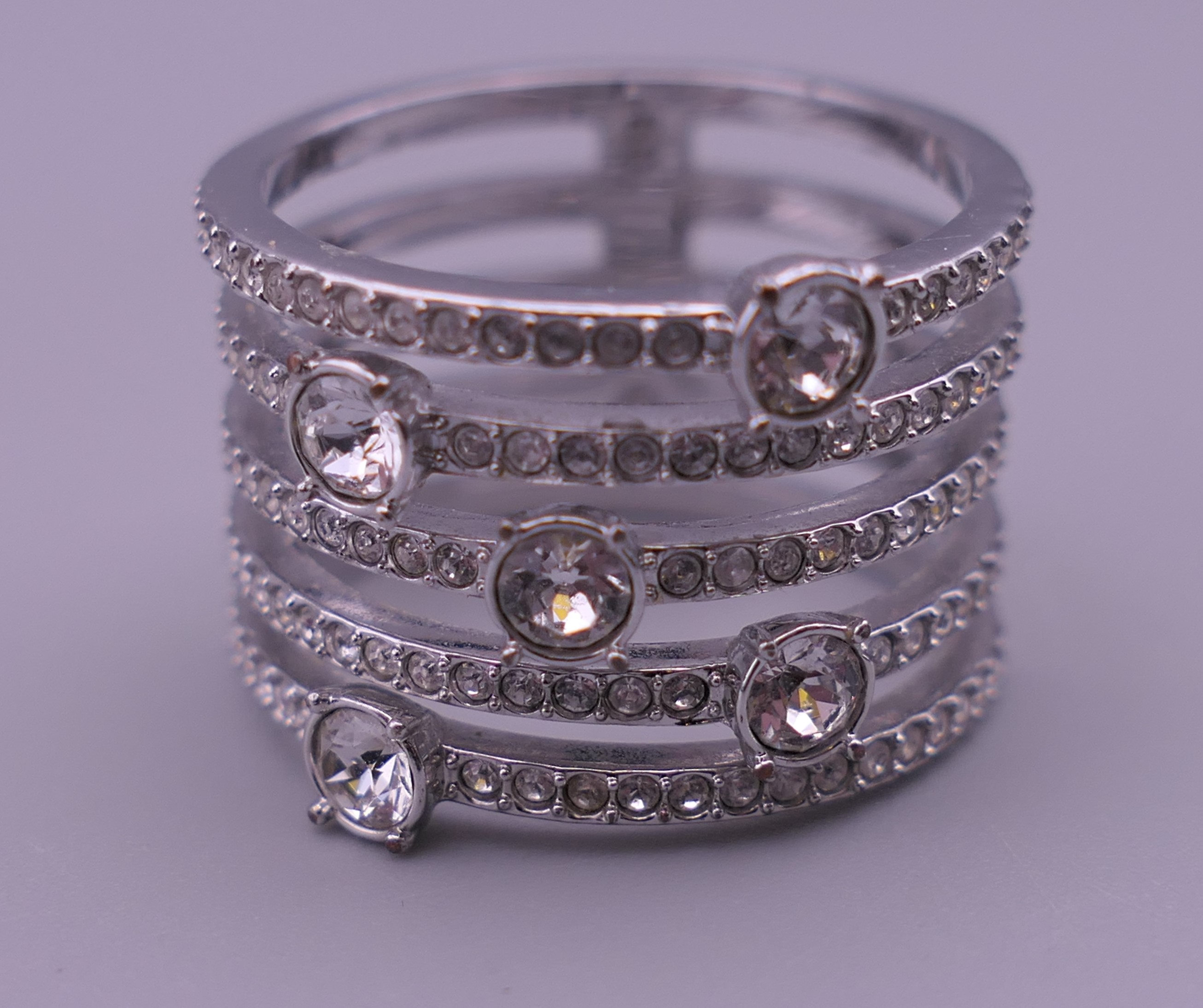 Three rings (one Swarovski), a cross pendant, a locket and another pendant. - Image 7 of 16