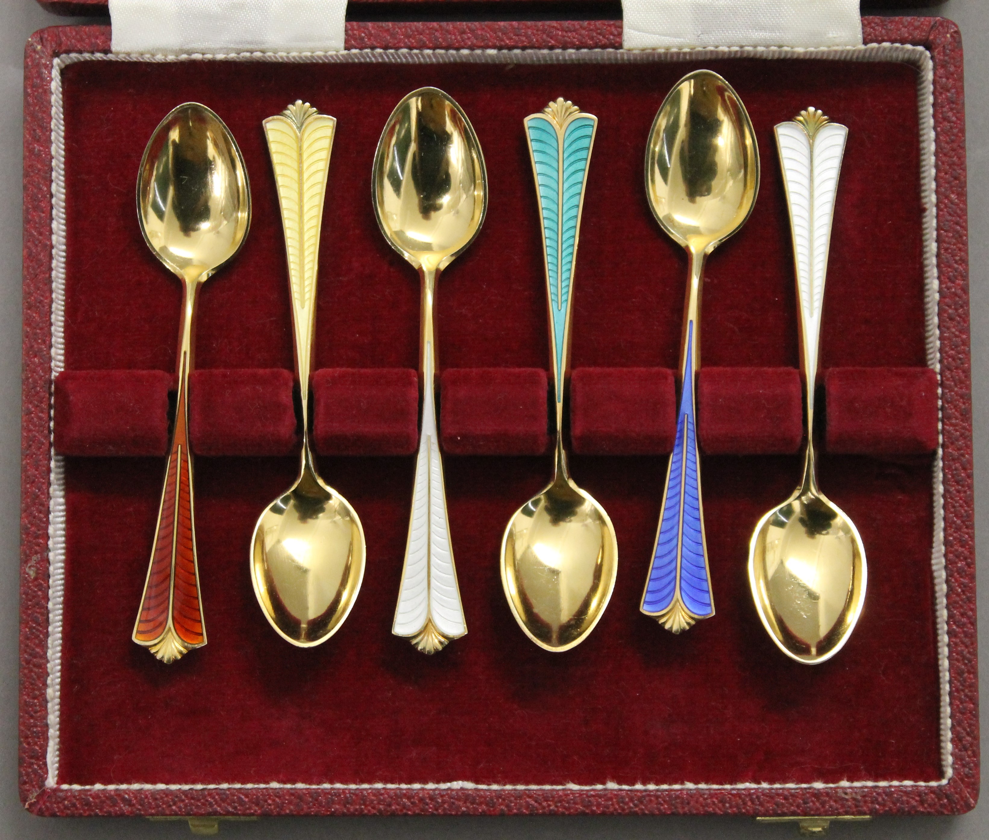 A set of six Norwegian silver gilt enamel teaspoons. 58.2 grammes total weight.