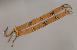 Two Indian head bands painted by Ojibwa Indians.