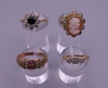 Four various 9 ct gold rings. 10 grammes total weight.