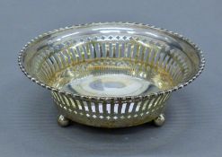 An American sterling silver pierced bon bon dish, circa 1920. 12 cm diameter. 69.2 grammes.