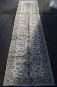 A Kashan rug. 490 x 100 cm.