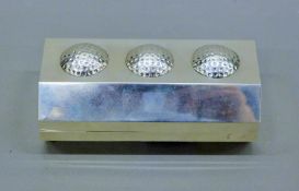 A silver clad golf ball holder. 15 cm long.