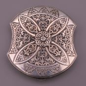 A Continental 900 silver compact. 7 cm wide.