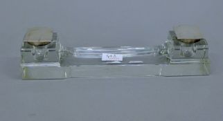 An Art Deco silver mounted glass desk stand. 34 cm long.