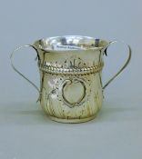A Georgian silver porringer. 8 cm high. 81.9 grammes.