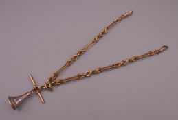 A 9 ct gold Albert watch chain with engraved fob seal. 36 cm long. 54 grammes total weight.