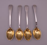 Four Georgian silver gilt teaspoons. 63 grammes.