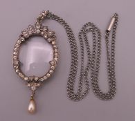 A French 925 silver paste set photo locket pendant. The pendant 6.5 cm high.