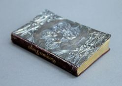A 19th century miniature book of Common Prayer, with silver hallmarked cover. 9.5 cm high.