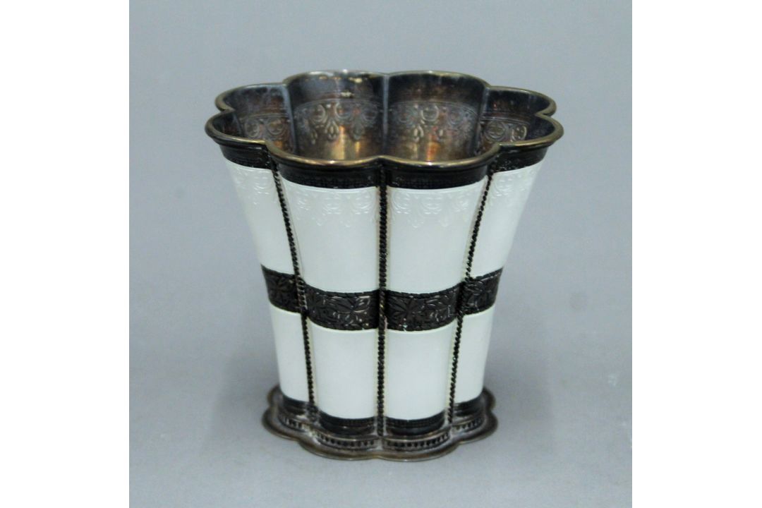 An A. Michelsen Copenhagen sterling silver white enamel decorated lobed vase. 8.5 cm high. 184. - Image 1 of 4