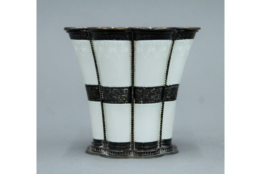 An A. Michelsen Copenhagen sterling silver white enamel decorated lobed vase. 8.5 cm high. 184. - Image 2 of 4