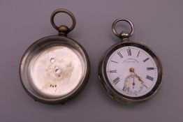 A silver pocket watch and a plated pocket watch case. The former 5 cm diameter.