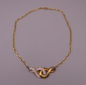 An 18 ct gold diamond necklace. 45 cm long. 23.9 grammes total weight.