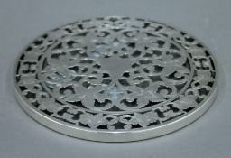 A Whiting & Co glass and sterling silver overlay circular stand. 15 cm diameter.