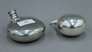 A novelty Pider Bros pewter golf club form spirit flask and a silver plated flask form muff warmer.