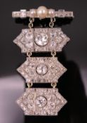 An Art Deco unmarked white gold or platinum three-tier diamond and pearl brooch,