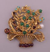 A Lucien Piccard 18 ct gold gem set floral spray brooch. 5 cm high. 19.6 grammes total weight.