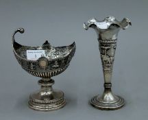 Two Indian silver vases. The largest 16.5 cm high. The smaller 179.6 grammes, the other weighted.