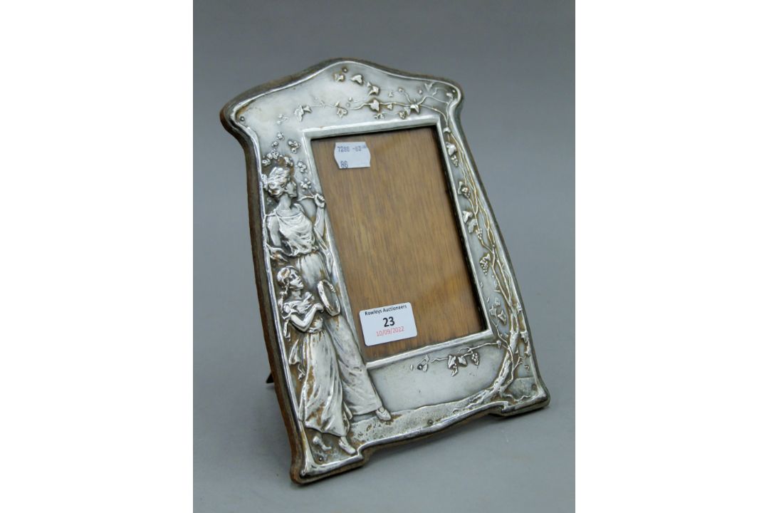 An Art Nouveau silver plated photograph frame, - Image 1 of 3
