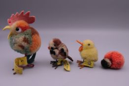 Three vintage Steiff chicks and a chicken. The largest 7.5 cm high.