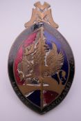 A vintage Vauxhall Motors Ltd enamel car badge. 7.5 cm high.
