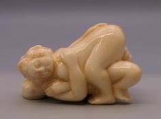 A bone erotic carving. 5 cm long.
