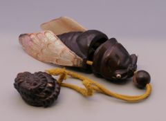 A Japanese fly form inro. 12 cm long.